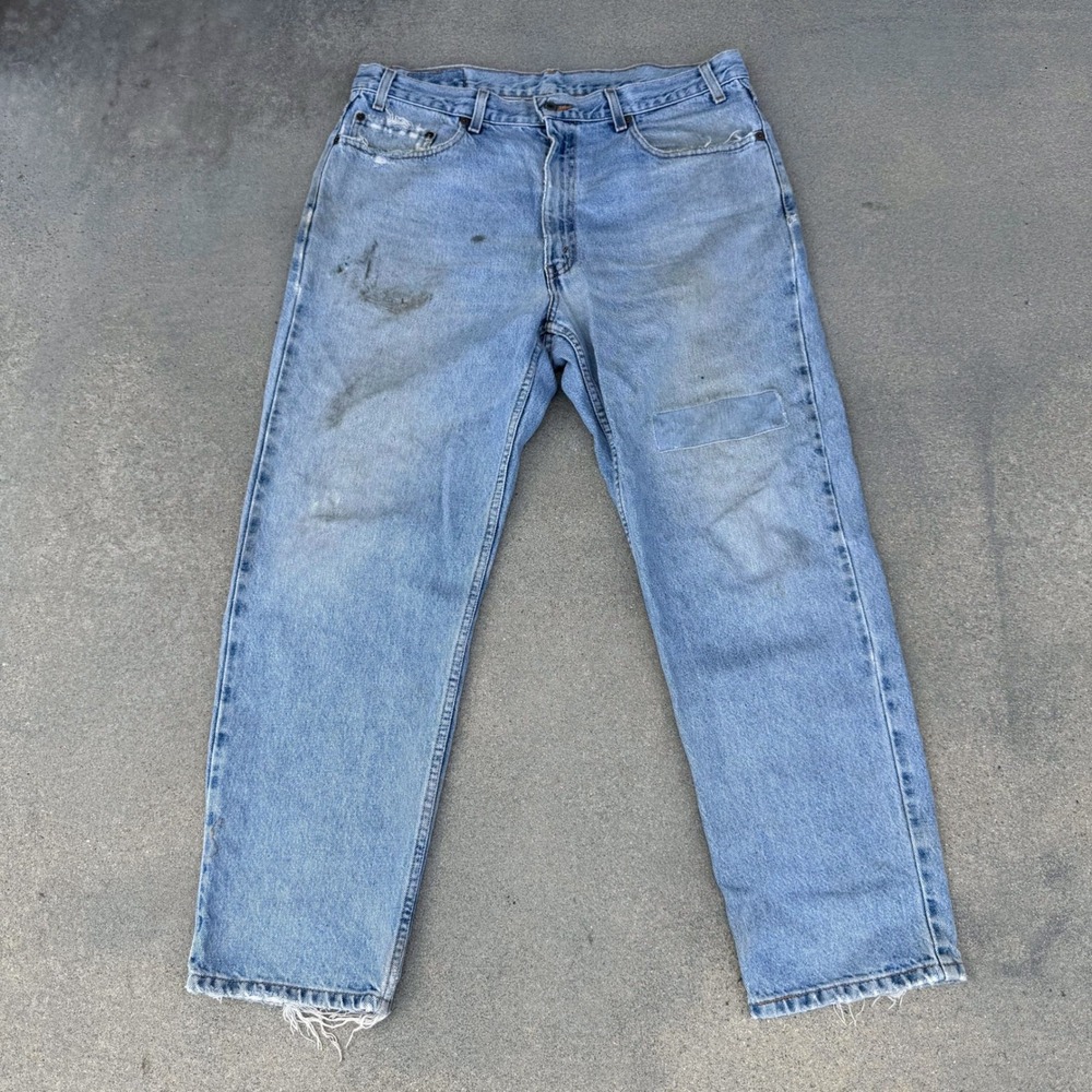 Vintage Levi's 550 Relaxed Straight Leg Jeans 38x30 Light Wash Distressed Wear